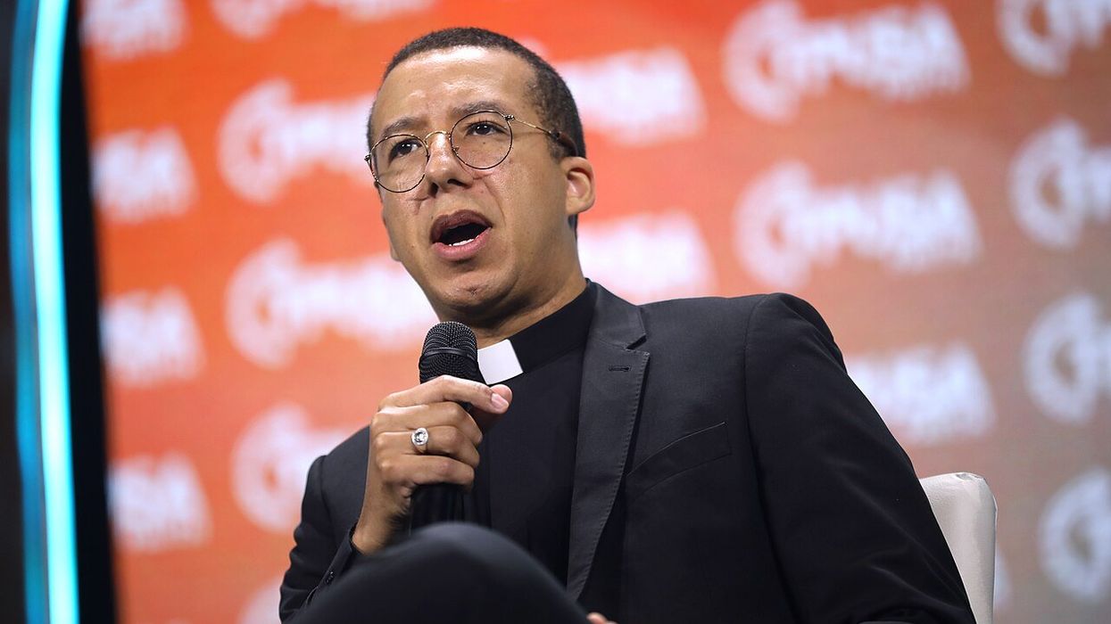Church leaders disavow right-wing priest for 'likely trolling' with controversial arm gesture