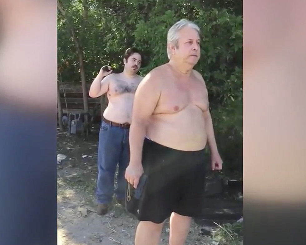 This Disturbing Video Shows a Father and Son Gun Down Their Neighbor During a Fight Over Trash
