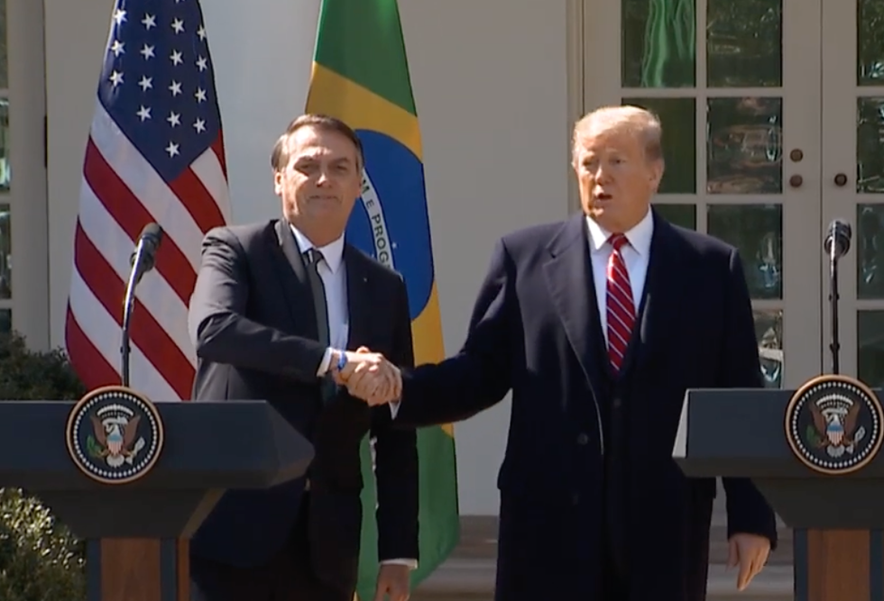 Brazil's Bolsonaro may reject aid package to fight Amazon fires because of feud with Macron