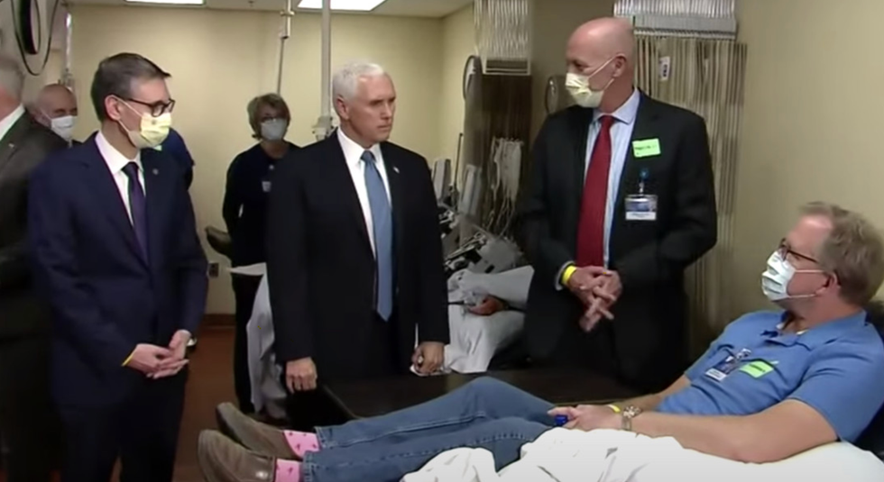 Mike Pence's refusal to wear a mask in a COVID ward was a display of cowardice, not courage