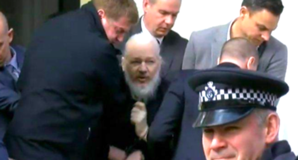 Julian Assange arrested in London after Ecuador withdraws asylum