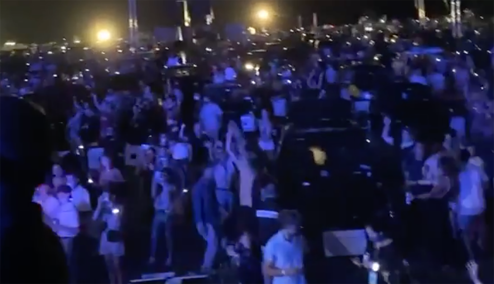 'We may be doomed': Outrage after Goldman Sachs CEO deejayed at a crowded Chainsmokers charity show in the Hamptons