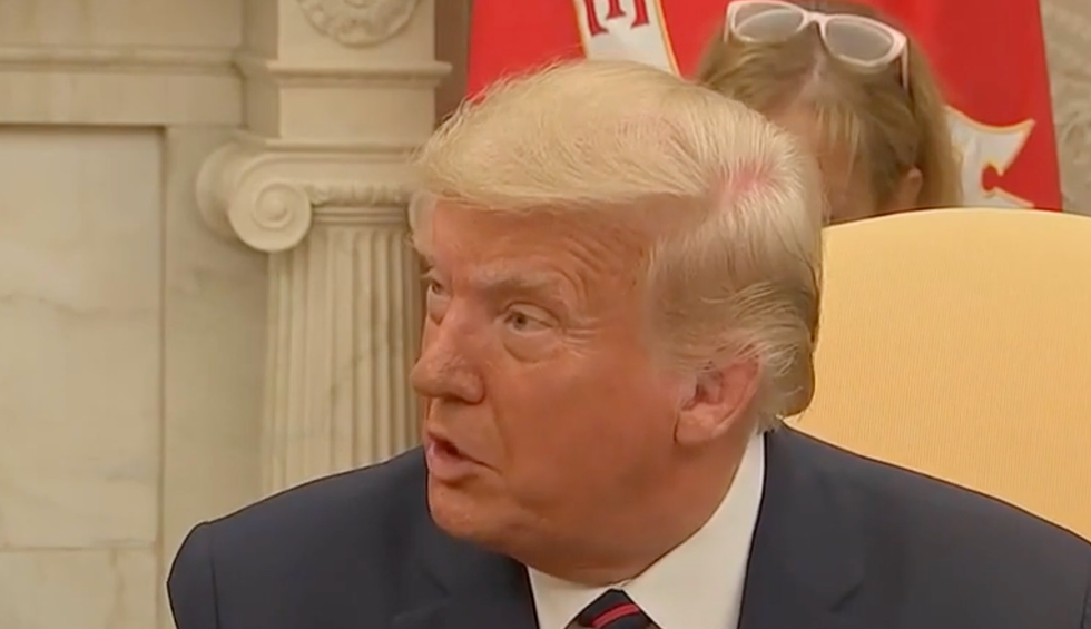 Trump blames 'showboaters' for border wall fraud — and desperately tries to distance himself