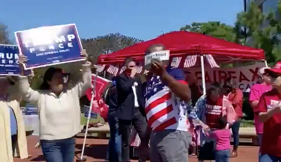 Did unruly Trumpers break the law at a Virginia polling place?