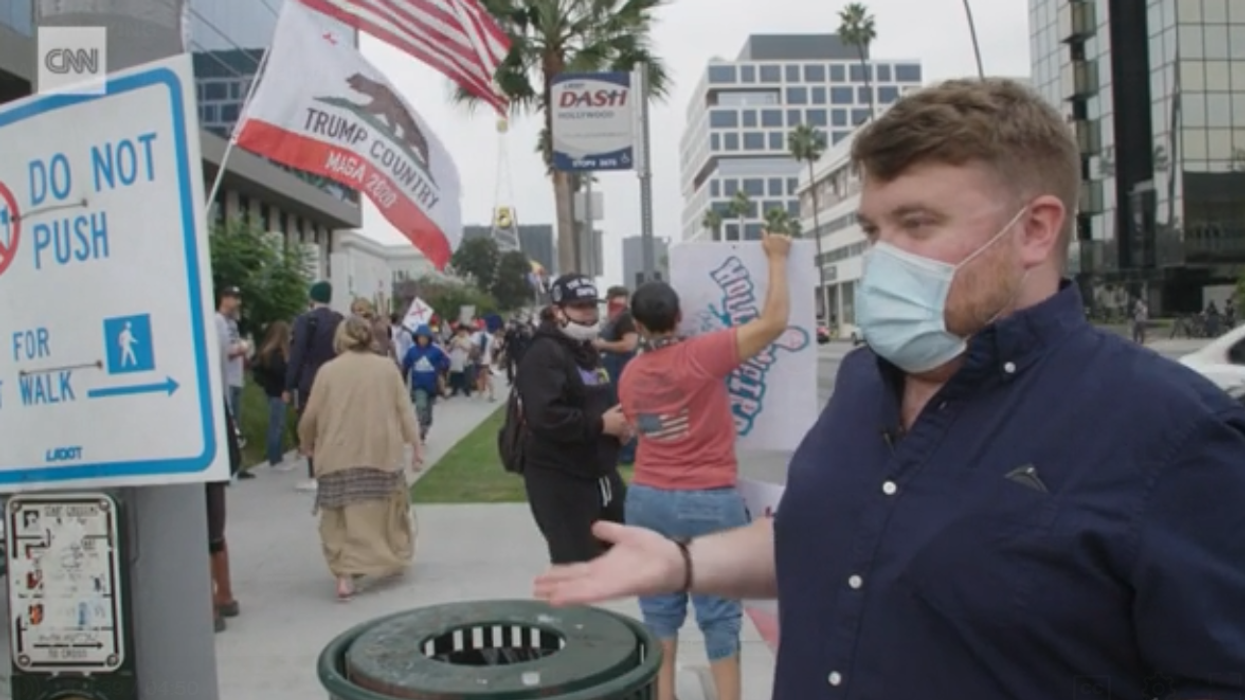 Watch: QAnon true believers let loose with their ridiculous theories to a CNN reporter