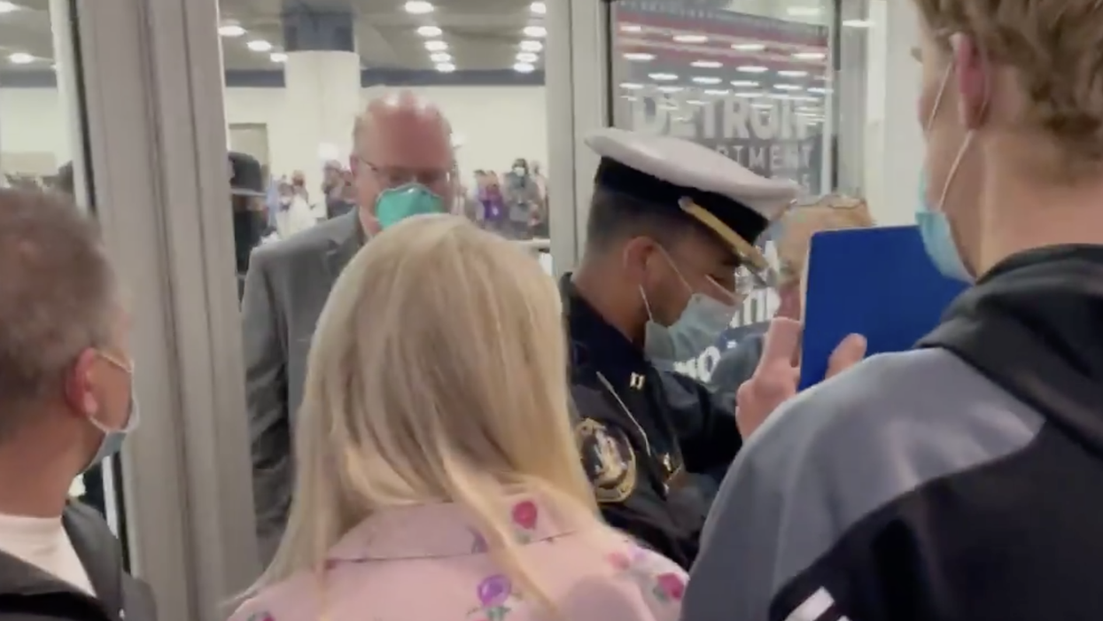 'Step back!': Rowdy crowd trying to stop vote counting forms at Detroit election center