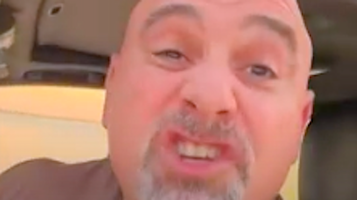 WATCH: Trump supporter tries to provoke young woman into a fight -- then flips out after she points out his baldness