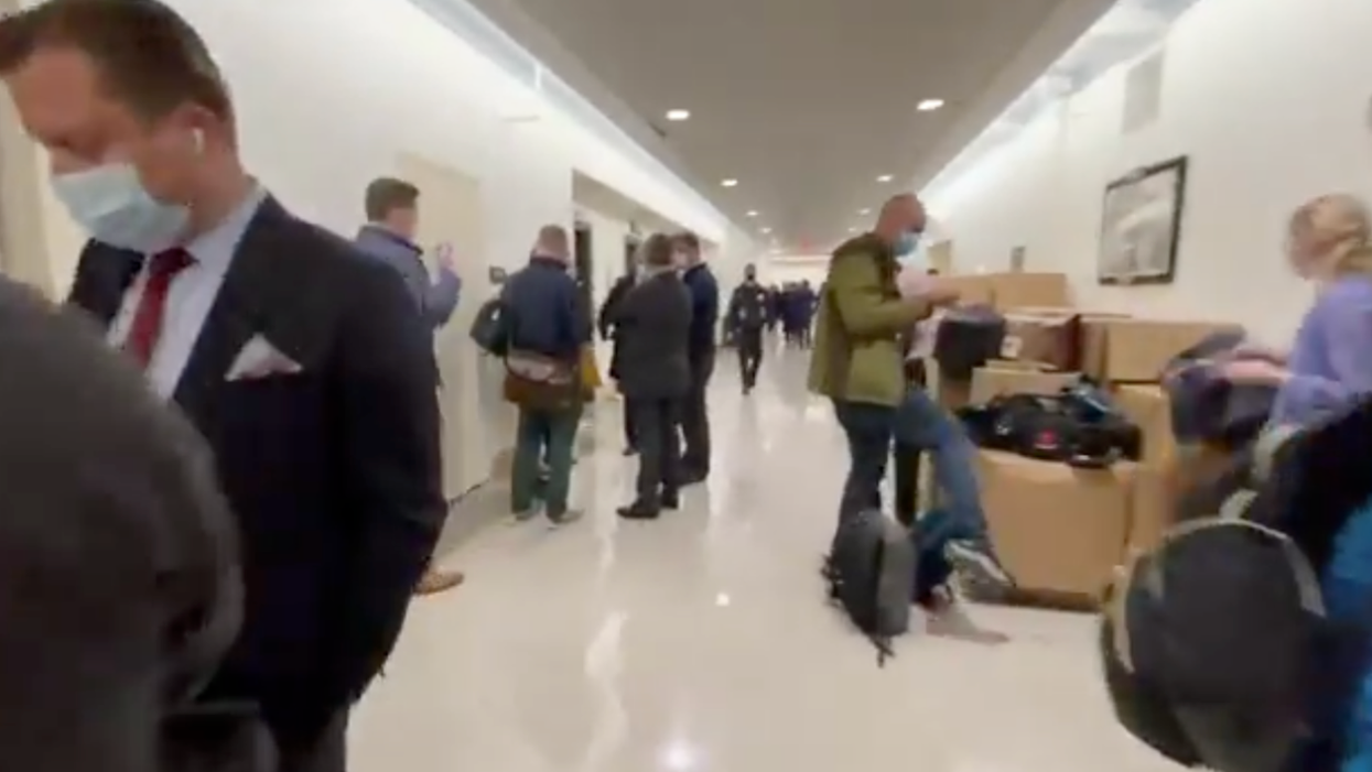 ‘This is horrifying’: Videos show injured officers being evacuated after clashes with Trump supporters
