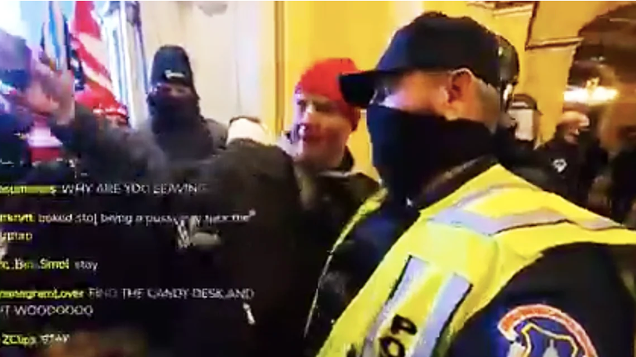 Shocking video catches Capitol Police member taking selfies with insurrectionists
