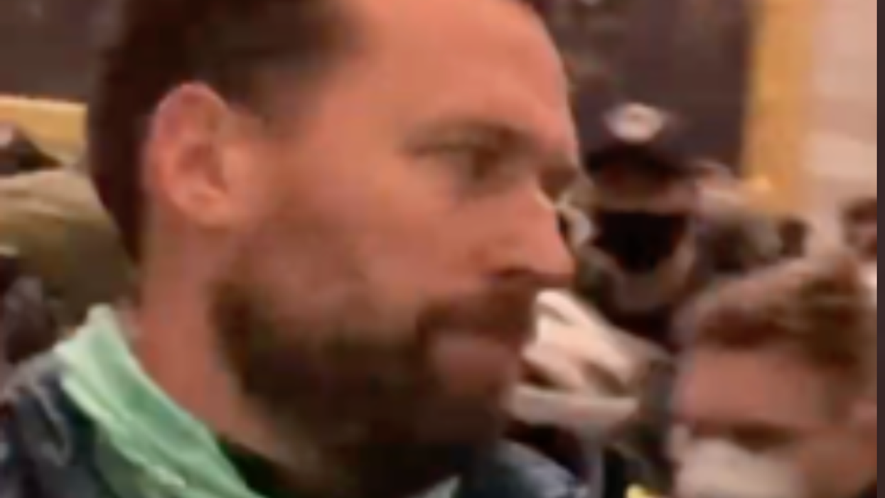 Calls grow for Olympics to strip gold medal swimmer of awards after teammates ID him among MAGA insurgents