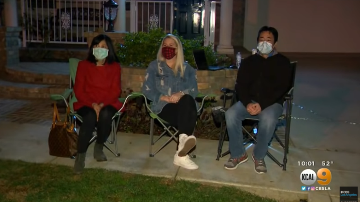 Neighbors stand guard at Asian-American family's home after they were harassed by racist extremists