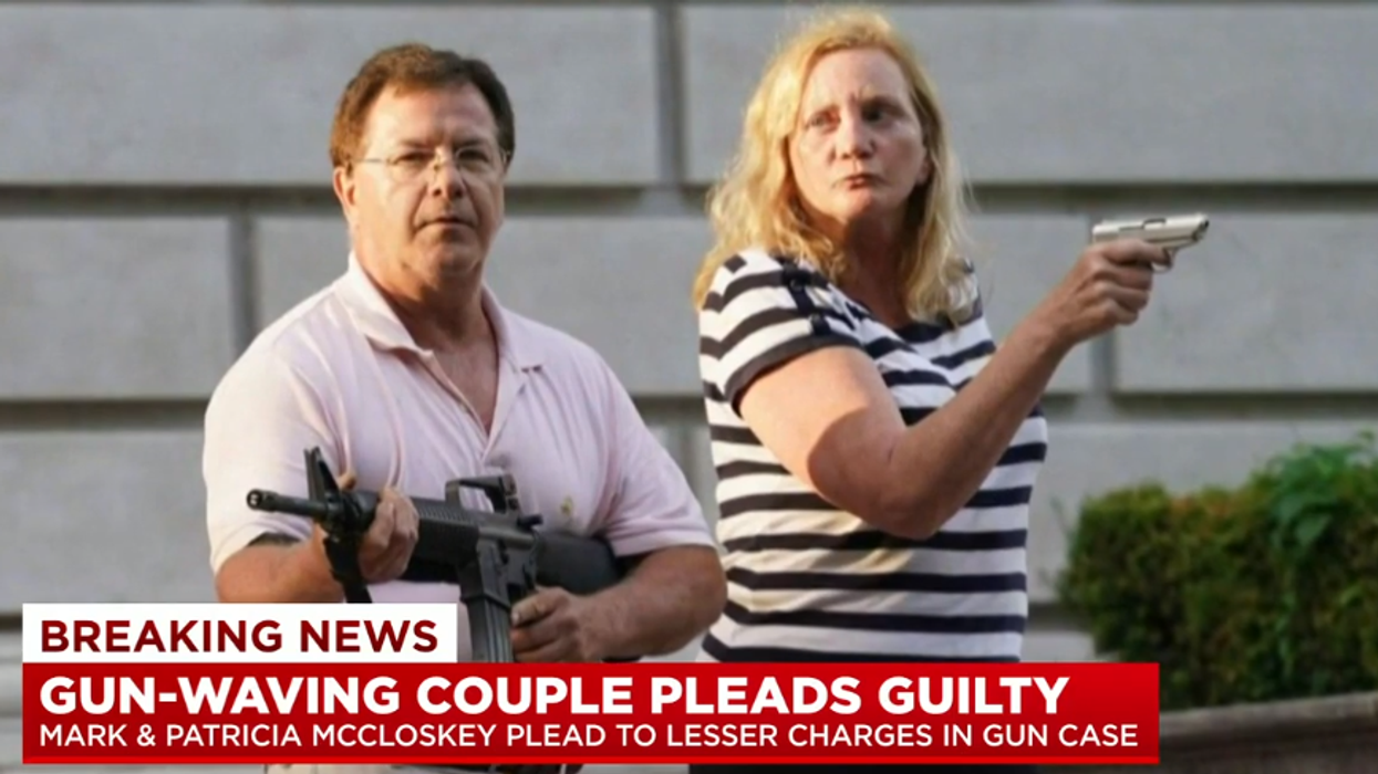 Critics slam Missouri's GOP governor for pardoning St. Louis couple who waved gun at BLM protesters