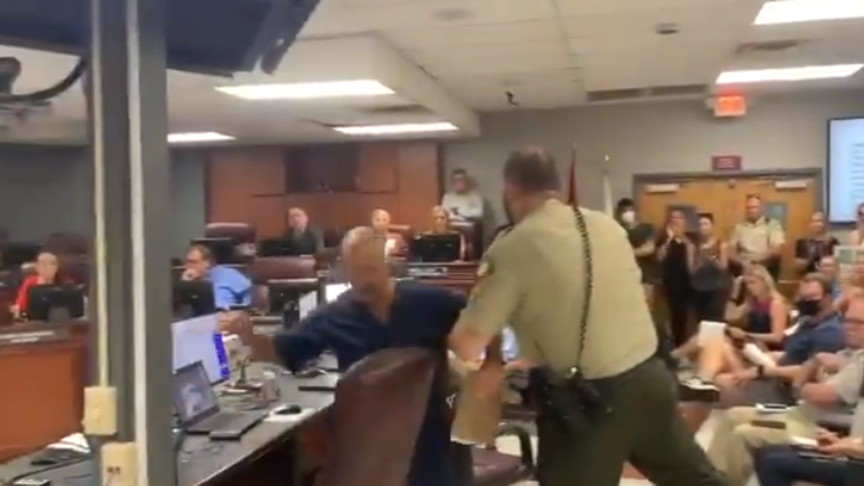 Watch: Angry unmasked Tennessee parents protest at school board mask mandate meeting as infections skyrocket