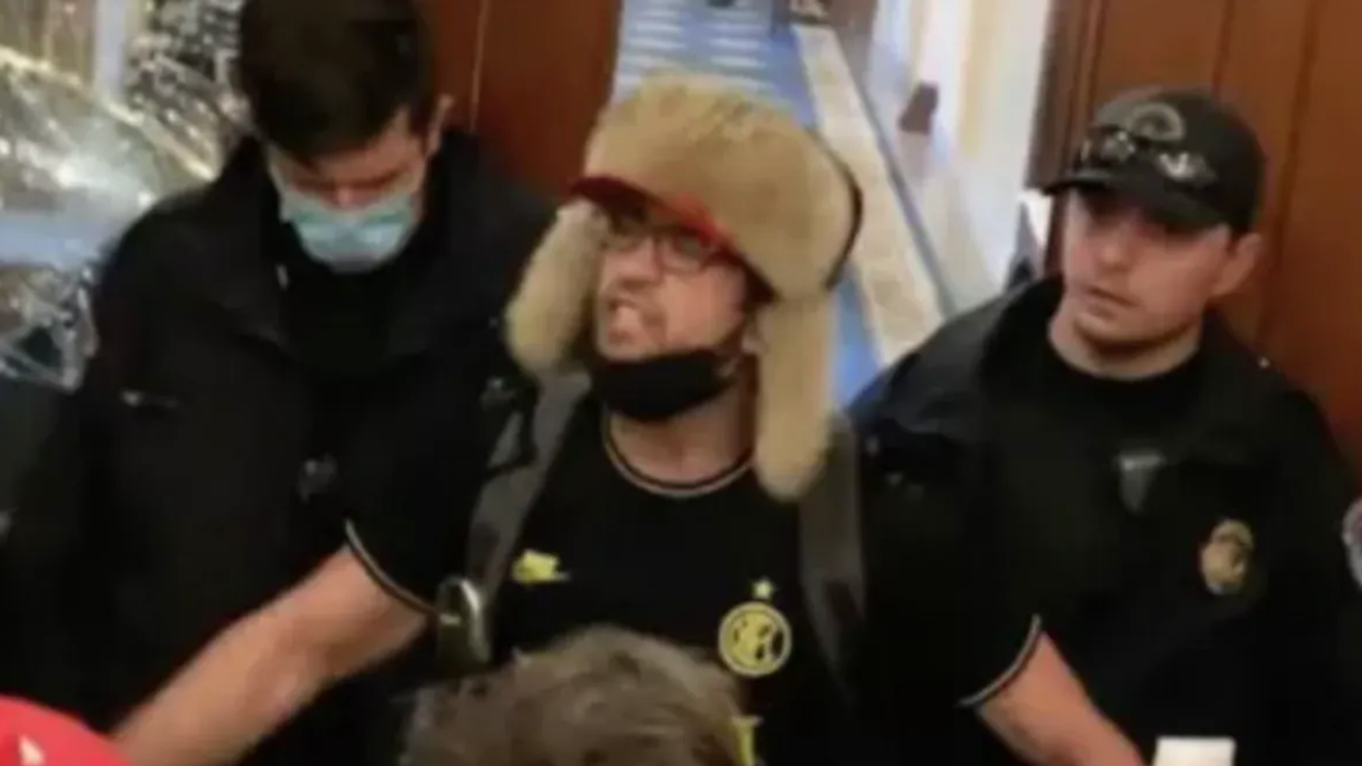 Court hearing devolves into a 'mess' as 'Helmet boy' Capitol rioter rejects plea deal and declares himself 'general counsel'