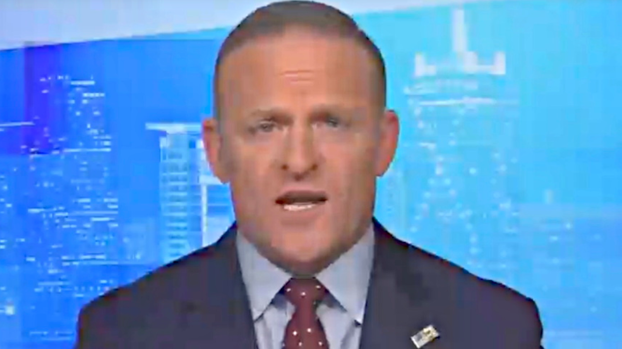 Newsmax host goes on racist rant accusing Biden of ‘waging war’ to ‘dilute’ the suburbs