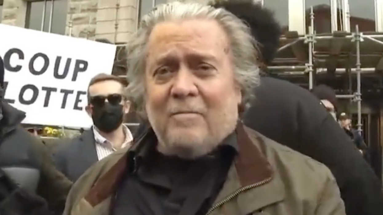 Steve Bannon ordered to surrender his passport but remains free after surrendering to law enforcement