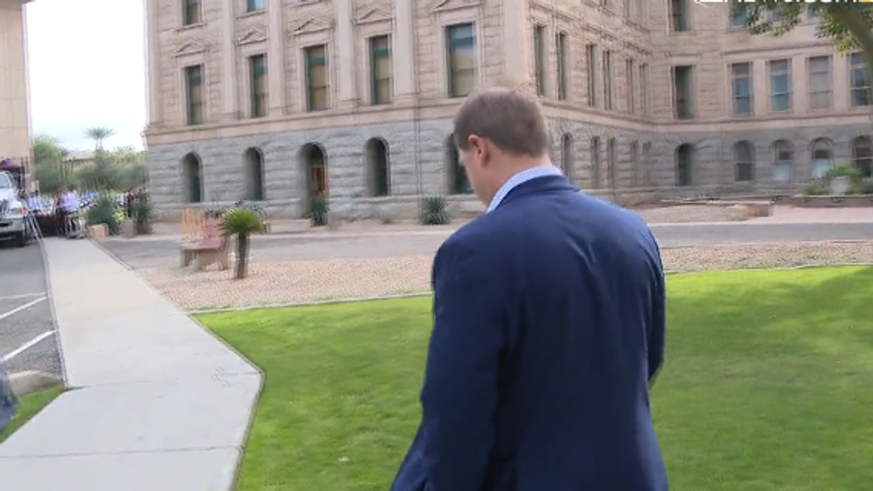 Watch: Arizona Republican who signed phony 'certification' saying Trump won flees from reporter's questioning