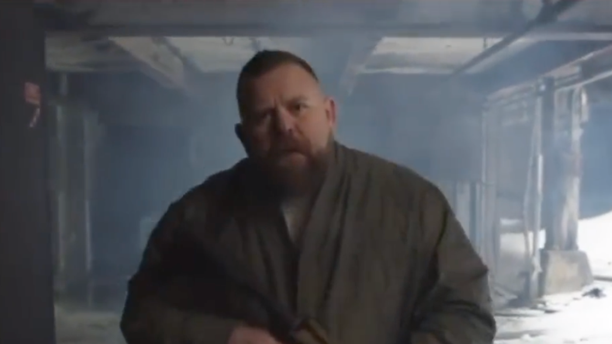 GOP congressional candidate shows images of Democrats and wields rifle in ominous campaign ad