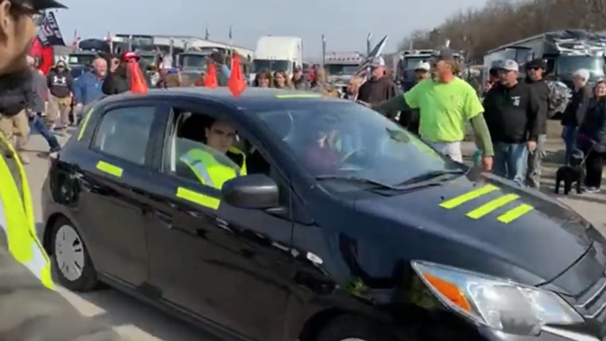 Camped outside DC, uneasy truckers paralyzed by paranoia vow to stay until demands met