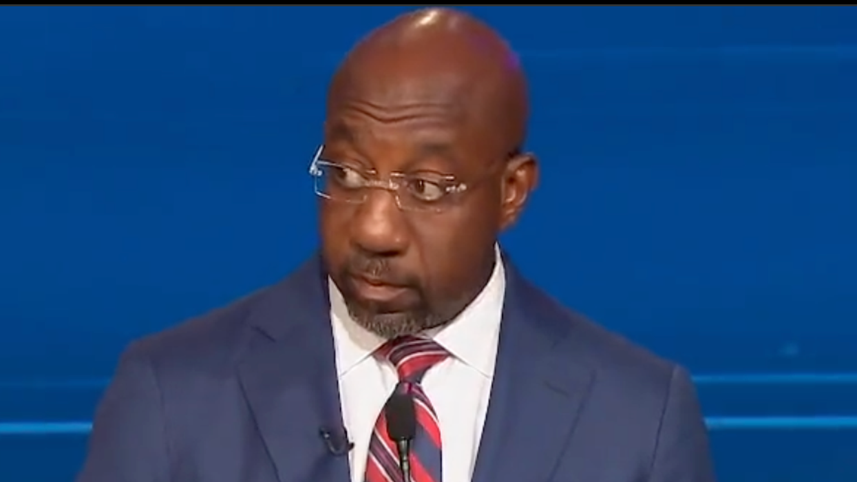 'He is not ready': Raphael Warnock reprimands empty podium after Herschel Walker skips debate
