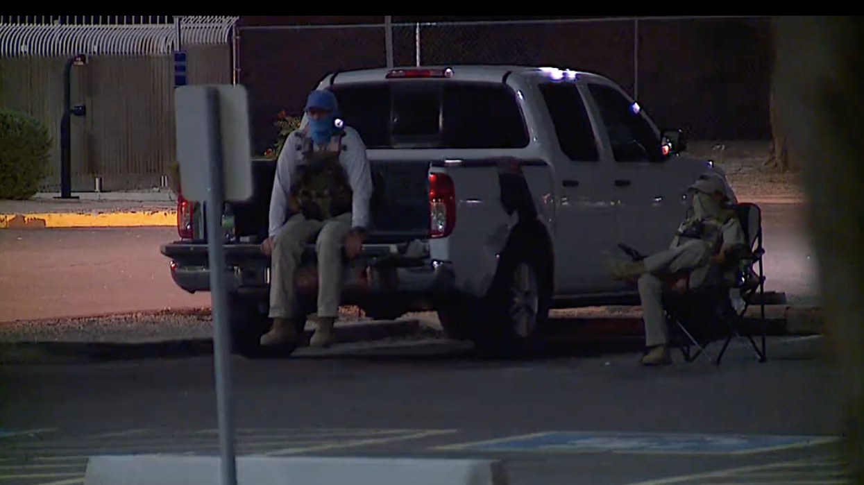 'They took photographs': Armed 'vigilantes' intimidate Arizona voters at mail-in ballot drop boxes