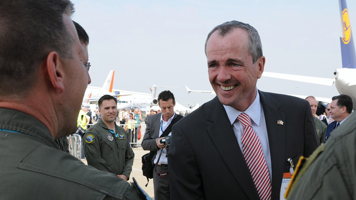 NJ governor signs law described as 'frontal assault' on good government