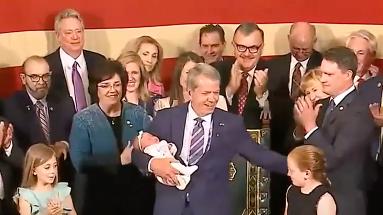 'Embarrassingly historic': GOP governor chided over 'children as photo-op props' at abortion ban signing