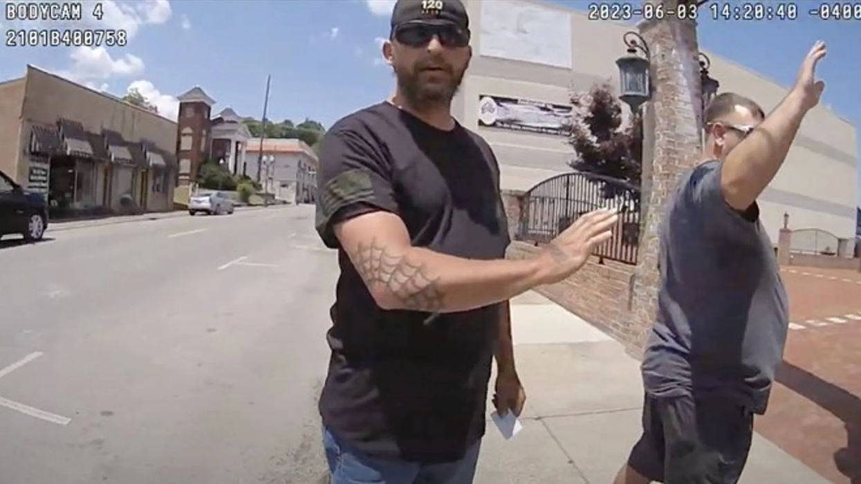 Watch: Kentucky cops release KKK member who pulled a loaded gun on LGBTQ protest