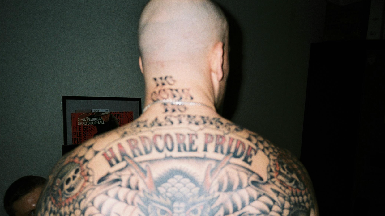 White supremacist with Nazi tattoos charged with 'truly heinous' axe murder
