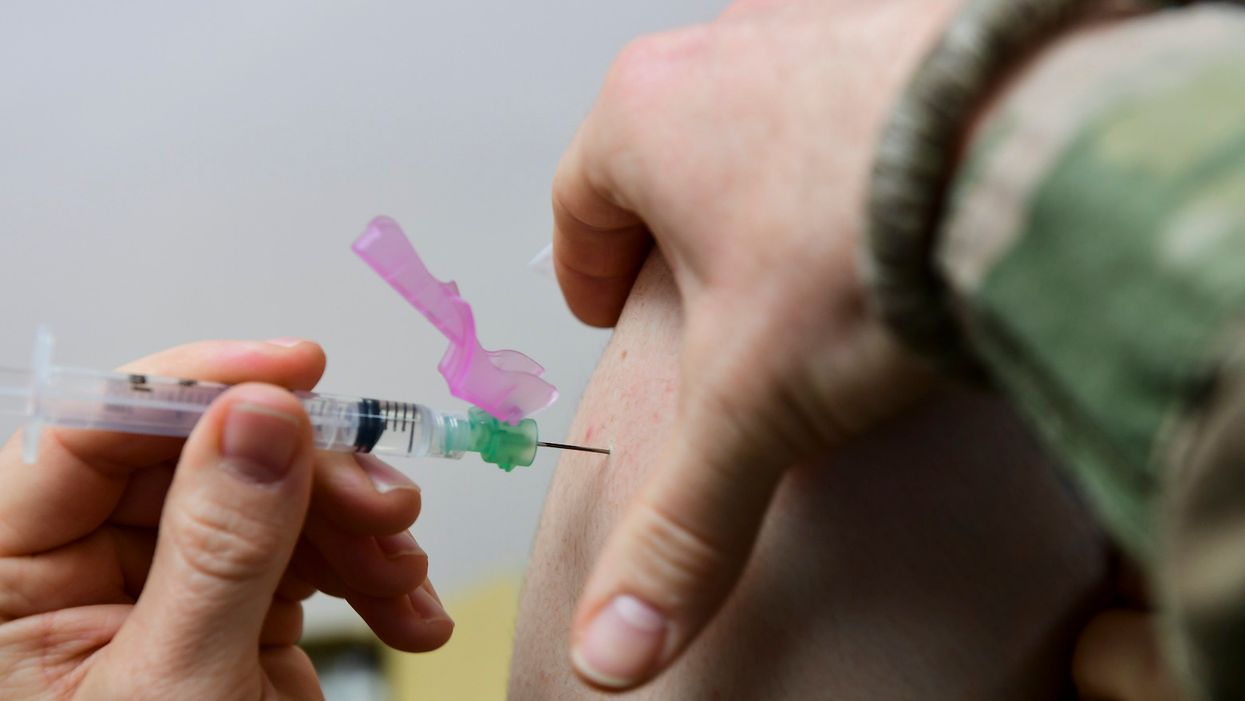 Officials apologize for vaccine chaos while insisting 20 million doses will still be delivered by year-end