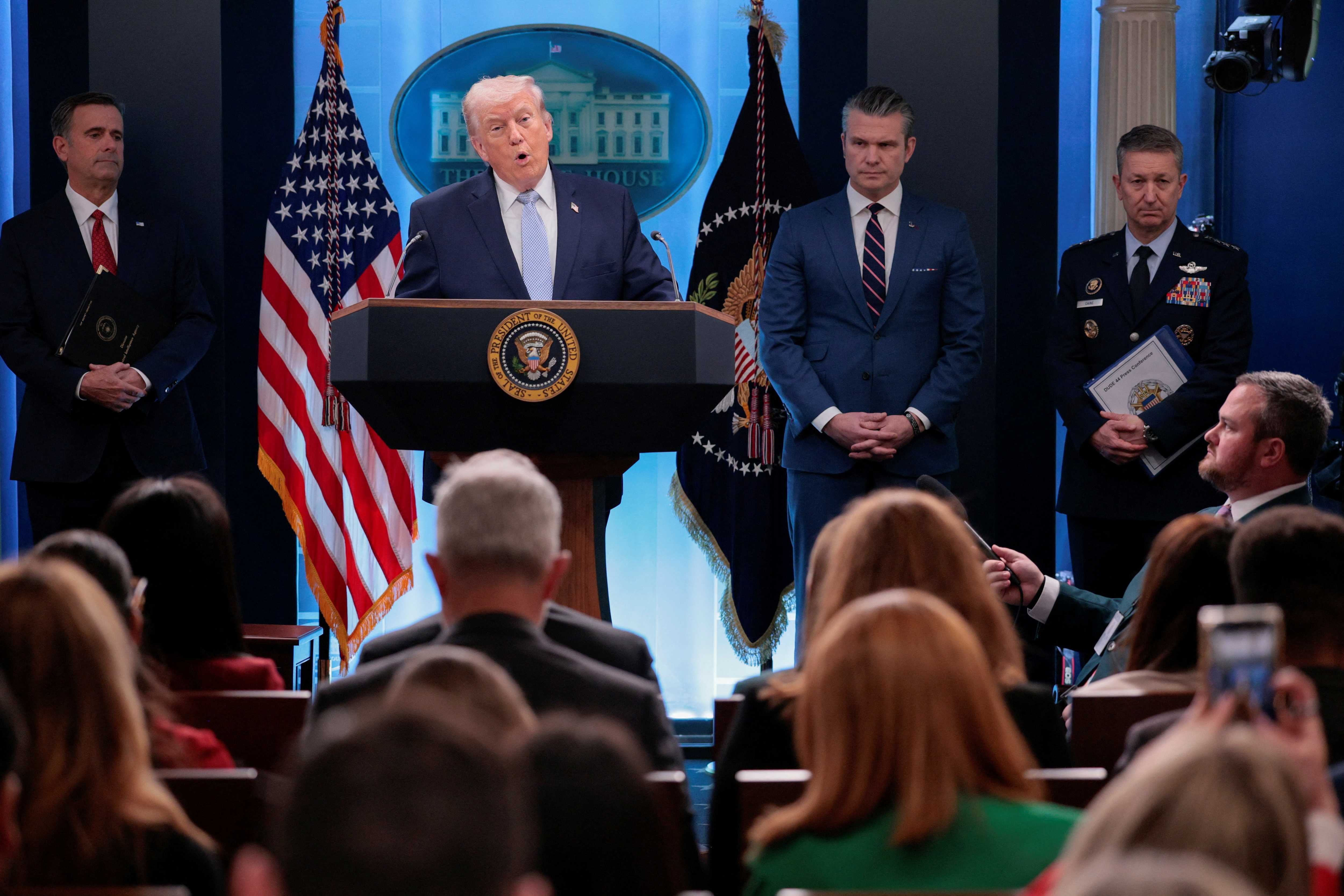 U.S. President Donald Trump holds a press conference accompanied by U.S. Secretary of Defense Pete Hegseth and Chairman of the Joint Chiefs of Staff Gen. Dan Caine in the James S. Brady Press Briefing Room at the White House in Washington, D.C., U.S., April 6, 2026.