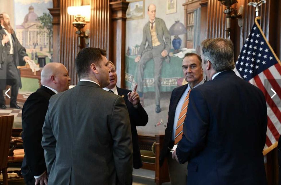 Red state goes to war with its largest city