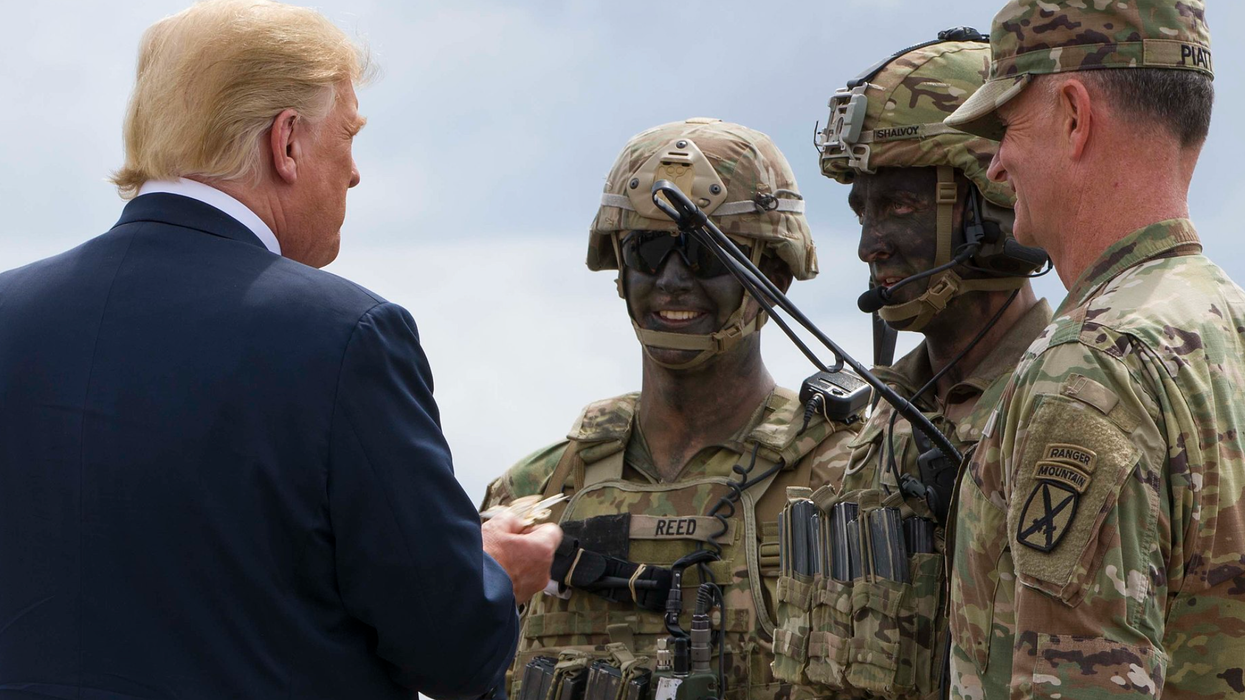 'Stuff of totalitarian regimes': Author warns Trump building 'his own paramilitary force'