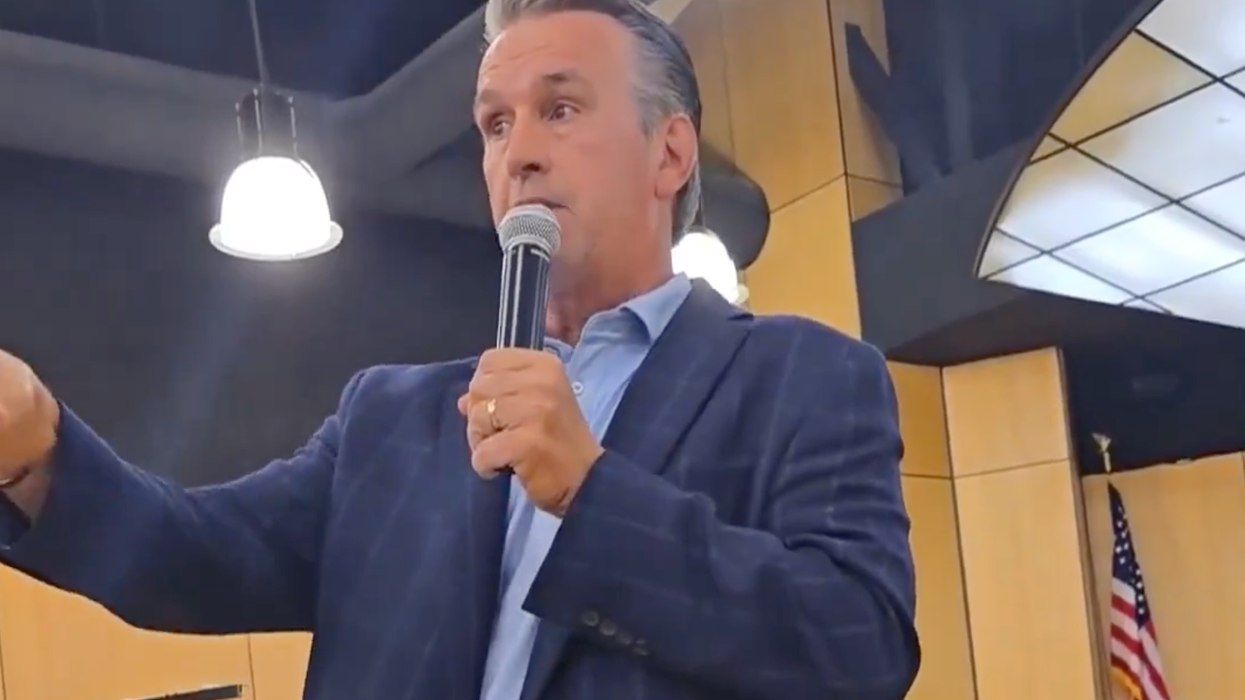 'Who pays?' GOP rep exits through back door after constituents hound him over Trump policy