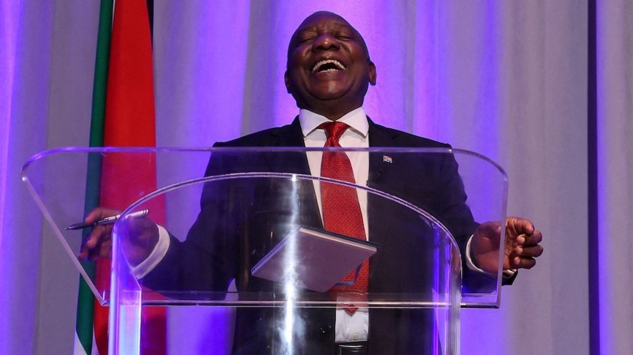 'It's happening to me again!' South African president mocks Trump to laughing audience
