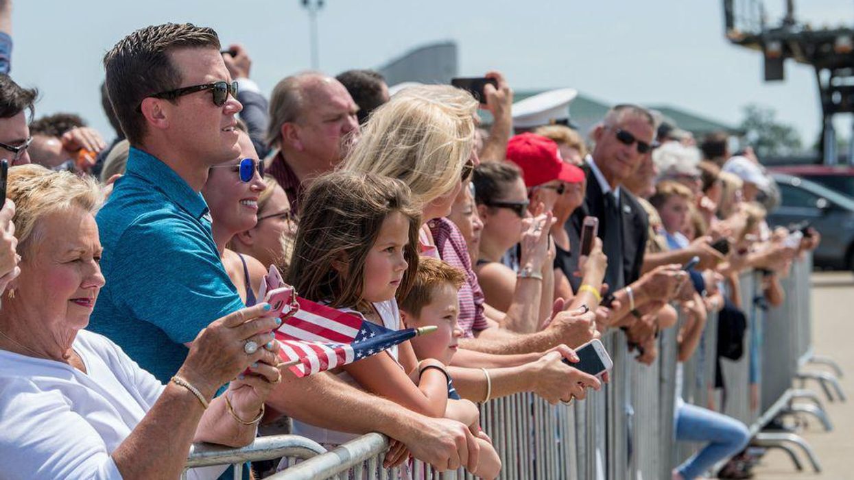 Watch: Right-wing voters pledge allegiance to flag from Jan. 6 at Bannon-hosted GOP rally