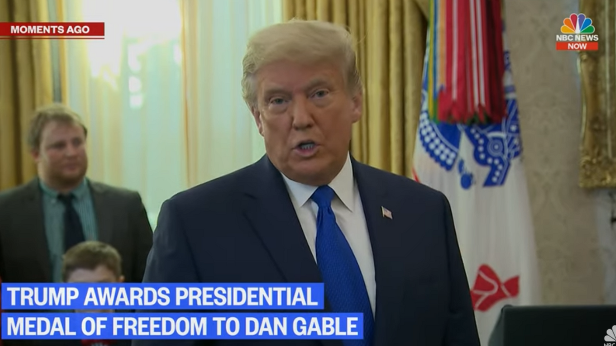 Watch: Trump awkwardly walks out on Medal of Freedom ceremony