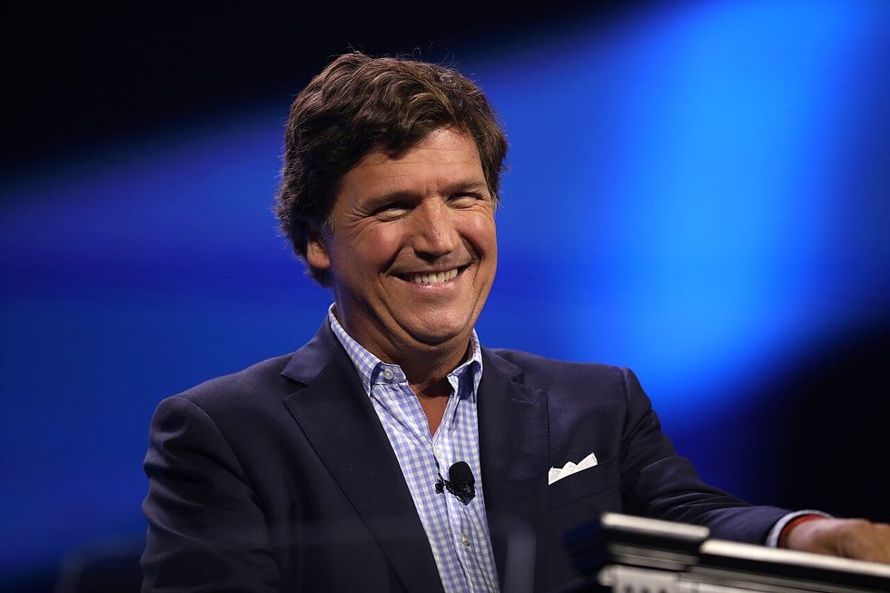 Tucker Carlson stumbles after reporter confronts him with his own words on Trump