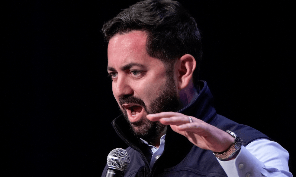 Republican mercilessly booed while trying to defend Trump