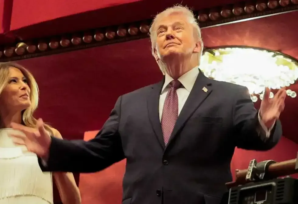 U.S. President Donald Trump and first lady Melania Trump attend the opening night of 'Chicago' at the John F. Kennedy Memorial Center for the Performing Arts, renamed by the Trump administration to The Donald J. Trump and The John F. Kennedy Memorial Center for the Performing Arts, in Washington, D.C., U.S., March 31, 2026.