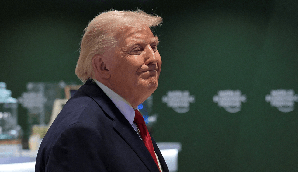 Trump stuns with overnight night posting spree after Davos departure