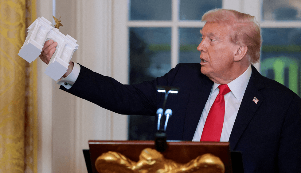 Revealed: The real reason Trump is building 'vulgar' monuments to himself