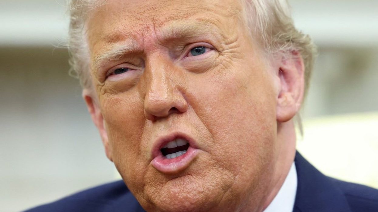 Director calls famous Trump cameo a 'curse' that he 'can’t cut' for fear of being deported