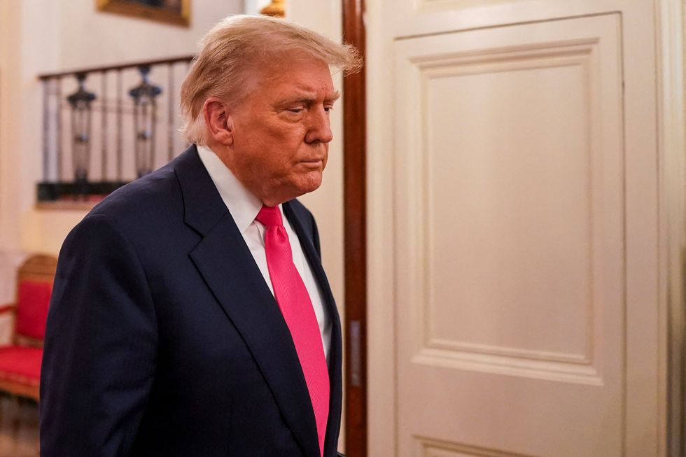 Trump sued over 'corrupt and illegal' gold card 'scheme'